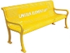 Personalized perforated thermoplastic bench in yellow with Lincoln Elementary cut-out lettering for school courtyards and outdoor seating areas
