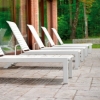 Picture of Telescope Kendall Strap Chaise Lounge with Armless Aluminum Frame