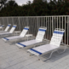 C120 - St. Maarten II Low Profile Stackable Vinyl Strap Chaise Lounge with 12" Seat Height - Lifestyle