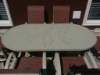 K-42X76PUNCH - 42” x 76” Oval Punched Aluminum Kingfisher Dining Patio Table - Lifestyle
