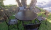 E-42Punch - Round Punched Aluminum Eclipse Dining Patio Table with Aluminum Frame - Lifestyle
