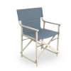 Commercial outdoor boss director chair with ivory aluminum frame and denim sling fabric seat and backrest for poolside and hospitality use.