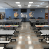 folding lunchroom tables with bench seating arranged in school cafeteria for flexible seating layouts