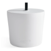 White Forma hospitality side table with an installed umbrella pole for in-pool shade