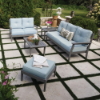 Blue Ridge HDPE outdoor conversation set with coffee table, sofa, loveseat, lounge chair, and ottoman creating a coordinated patio seating area