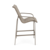 Side view of Horizon commercial outdoor bar chair with Satin Amber aluminum frame and Cane Weaver Pacific sling seating