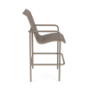 Side view of Sundance sling commercial bar chair with neutral Sisal fabric, Satin Amber aluminum frame, armrests, and bar-height footrest