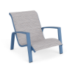 Skyline stackable padded sling sand chair featuring patterned Broadway fabric, Steel Blue aluminum frame, and supportive low-profile seating