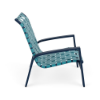 Side profile of a low outdoor sand chair with a metallic deep blue powder-coated frame and woven turquoise vinyl straps.