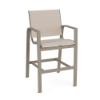 Three-quarter front view of an elevated commercial outdoor bar stool featuring a satin amber powder-coated aluminum frame and beige Cane Oyster sling fabric.