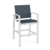 Front perspective view of a commercial patio bar chair with a white aluminum frame and deep navy blue sling fabric