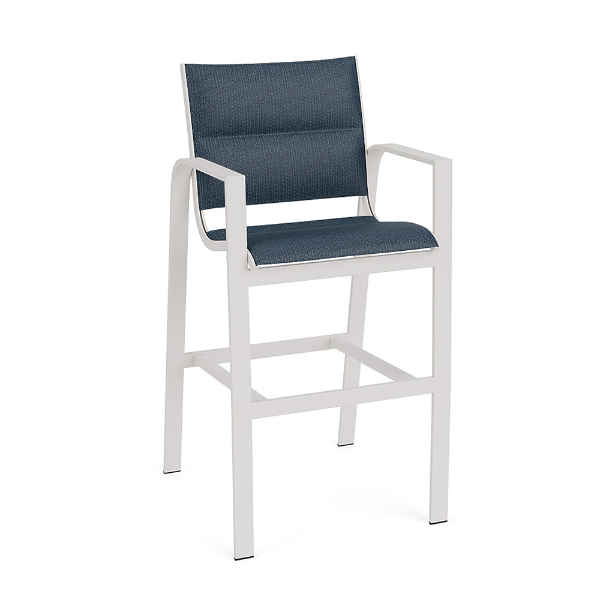 Front perspective view of an outdoor bar chair featuring a sky white aluminum frame and deep navy blue padded sling seating.