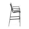 Side profile view of a high-top commercial patio bar chair with a starlight black metal frame, integrated footrest, and dark metallic platinum padded sling fabric.