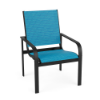 Three-quarter front view of a commercial outdoor dining armchair featuring a dark textured charcoal aluminum frame and vibrant bright blue sling fabric.