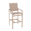 Three-quarter front view of a high-top commercial patio bar chair featuring a satin amber powder-coated frame and light beige Charm Tango sling fabric.