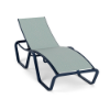 Three-quarter front view of a commercial pool deck chaise lounge with a deep blue metallic frame and light seafoam green woven sling seating.