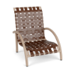Three-quarter front view of a low-profile commercial outdoor sand chair featuring a textured beige aluminum frame and rich Saddle brown vinyl cross-weave straps.