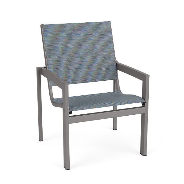 Three-quarter front view of a commercial outdoor patio dining chair with armrests, a metallic Titanium Gray frame, and a slate blue Kozo Jewel textured double sling seat.
