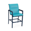 Front three-quarter view of a commercial outdoor bar chair featuring a dark blue powder-coated aluminum frame, lower support rungs, and a bright turquoise blue padded sling seat and backrest.
