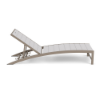 Side profile view of an adjustable outdoor chaise lounge showing the multi-position ratchet mechanism, a beige Satin Amber frame, and off-white Marine Grade Polymer slats.