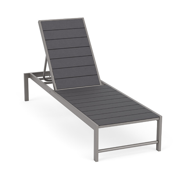 Front three-quarter view of an adjustable commercial outdoor chaise lounge with a Platinum powder-coated aluminum frame and dark Susquehanna Grey Marine Grade Polymer (MGP) slatted surface.