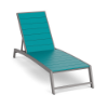 Three-quarter perspective view of a commercial pool deck chaise lounge featuring a sleek Titanium Gray aluminum frame and vibrant turquoise Aruba Blue MGP slatted seating.