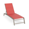 Front perspective view of an adjustable pool chaise lounge featuring a warm beige Satin Amber frame paired with a coral red Straw Mat padded sling.
