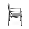 Side profile view of a modern commercial patio dining armchair designed with a smooth matte Starlight Black frame and a woven metallic silver-gray Metallica Platinum sling.