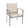 Front three-quarter perspective view of a commercial outdoor dining armchair featuring a warm beige Satin Amber powder-coated frame and a light neutral Cane Oyster padded sling backrest and seat.