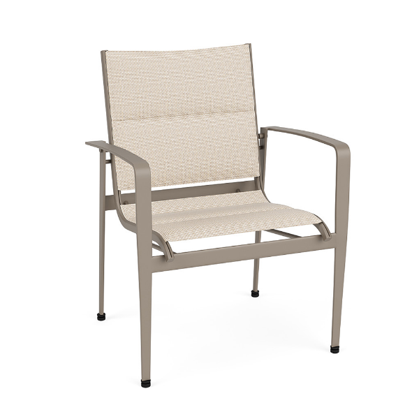 Front three-quarter perspective view of a commercial outdoor dining armchair featuring a warm beige Satin Amber powder-coated frame and a light neutral Cane Oyster padded sling backrest and seat.
