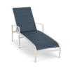 Front perspective view of a commercial pool deck chaise lounge featuring a clean Sky White aluminum frame paired with a textured dark blue Streamline Azure padded sling bed.