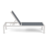 Side view of Coastal MGP commercial outdoor chaise lounge with White aluminum frame, Navy MGP slatted surface, and adjustable backrest