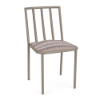A front three-quarter view of a commercial outdoor armless dining chair featuring a taupe Satin Amber aluminum frame and a multi-toned, zig-zag patterned Valley Dune cushioned seat.