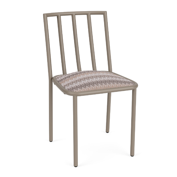 A front three-quarter view of a commercial outdoor armless dining chair featuring a taupe Satin Amber aluminum frame and a multi-toned, zig-zag patterned Valley Dune cushioned seat.
