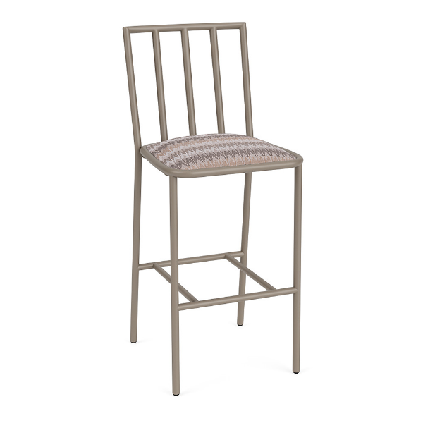A front three-quarter perspective view of a high-top commercial patio bar stool featuring a taupe Satin Amber aluminum frame, vertical slatted back, and a multi-toned, zig-zag patterned Valley Dune seat cushion.