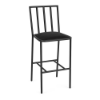 A front three-quarter view of an all-black commercial outdoor bar height chair featuring a sleek black powder-coated aluminum frame, built-in footrest stretcher, vertical backrest spindles, and a solid Starlight Black cushioned seat.