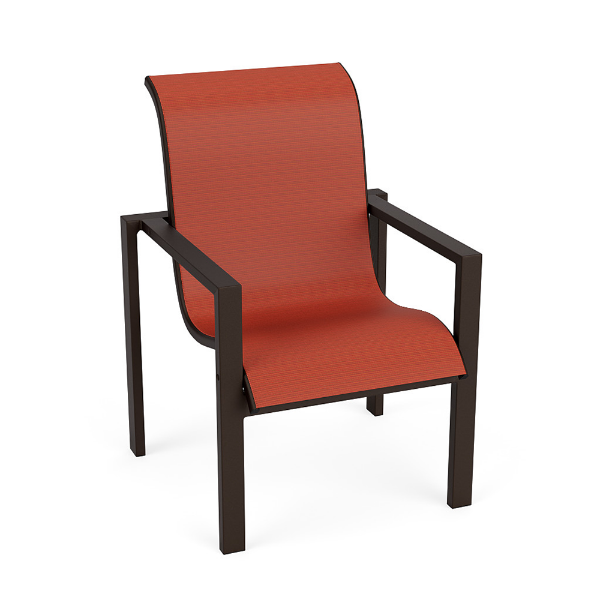 A front three-quarter view of a modern commercial outdoor armchair designed with a dark Coffee Bean powder-coated aluminum frame, clean rectangular arms, and a warm terracotta-red Metallic Salsa sling fabric.