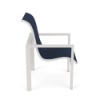 A side profile view of a modern stackable commercial outdoor dining chair featuring a crisp Sky White square tubular aluminum frame, straight geometric armrests, and a deep navy blue Dupioni Sapphire sling fabric seat and backrest.