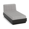 A front three-quarter view studio product shot of a plush commercial outdoor chaise lounge featuring a dark Black Granite Marine Grade Polymer (MGP) platform base with an upholstered, thick light gray outdoor fabric cushion.