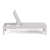 Side profile view showing the reclining backrest notch mechanism, solid panel back, and horizontal slat seat design of the white Leisure MGP outdoor chaise lounge.