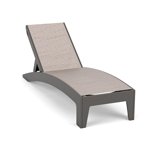 Front three-quarter view of an arched Marine Grade Polymer chaise lounge featuring a dark grey Fossil Grey frame and a subtle textured Kozo sling fabric seat.