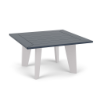 Front three-quarter view of a 34-inch square Marine Grade Polymer outdoor coffee table featuring white legs and a dark navy blue paneled square tabletop.