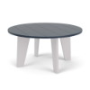 Front three-quarter view of a 36-inch round Marine Grade Polymer outdoor coffee table featuring white tapered legs and a dark navy blue slat-style round tabletop.