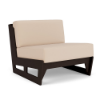 Three-quarter angle view of an armless commercial outdoor right modular lounge chair with a dark woodgrain-finish MGP frame and light cream-colored cushions.