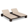 Three-quarter perspective view of a double commercial outdoor chaise lounge made of dark chocolate resin wicker with individually adjustable backrests and off-white cushions