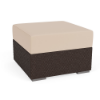 Three-quarter perspective view of a square commercial outdoor ottoman featuring a dark brown Java Chocolate woven synthetic wicker base topped with a thick, solid beige cushion.
