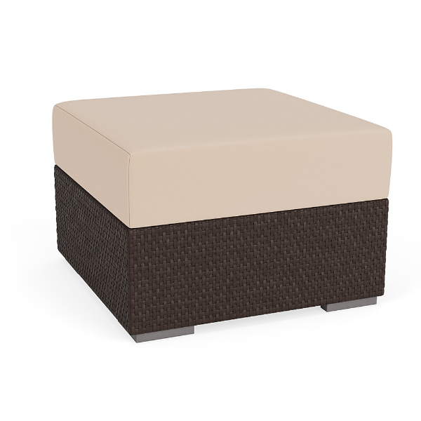 Three-quarter perspective view of a square commercial outdoor ottoman featuring a dark brown Java Chocolate woven synthetic wicker base topped with a thick, solid beige cushion.