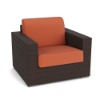 Three-quarter perspective view of a commercial outdoor club chair constructed from dark brown Java Chocolate synthetic wicker, topped with vibrant terracotta orange seat and back cushions.