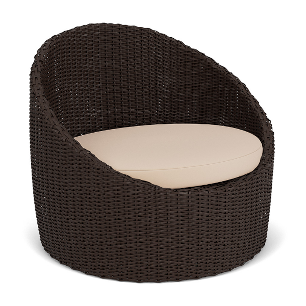 Three-quarter perspective view of a rounded, barrel-style outdoor lounge chair made with dark brown Java Chocolate resin wicker and a fitted off-white/beige seat cushion.