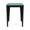 Straight-on front view of a 30-inch square marine-grade polymer (MGP) outdoor bar-height table featuring a bright Aruba teal slatted top set on a contrasting black frame and tapered legs.